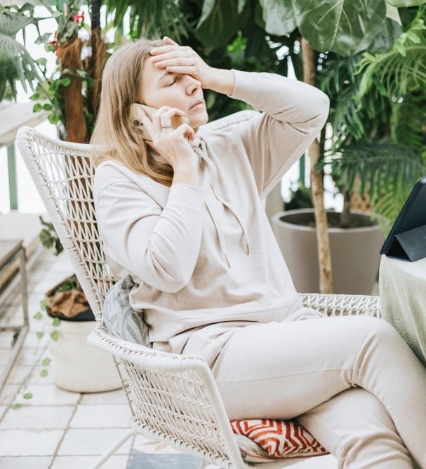 Image of a woman sitting in a chair
